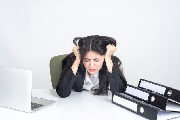Free photo business woman is stressed from work